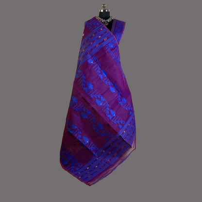 Purple and blue patterned fabric on a mannequin against a beige background