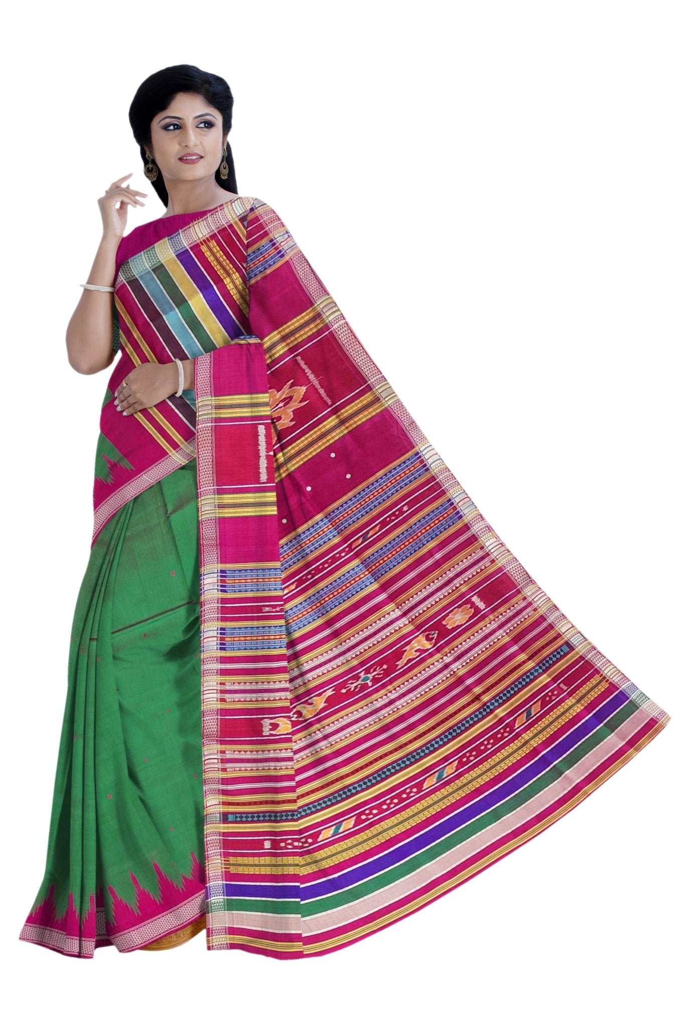 A woman modeling a vibrant green and magenta pink saree with multicolored striped borders, set against a plain white background. Full drape front view with pallu