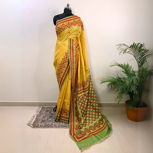 Yellow Tussar Silk Saree – Hand Embroidered Gujrati Stitch -Handloom Sarees- Aananda Collections